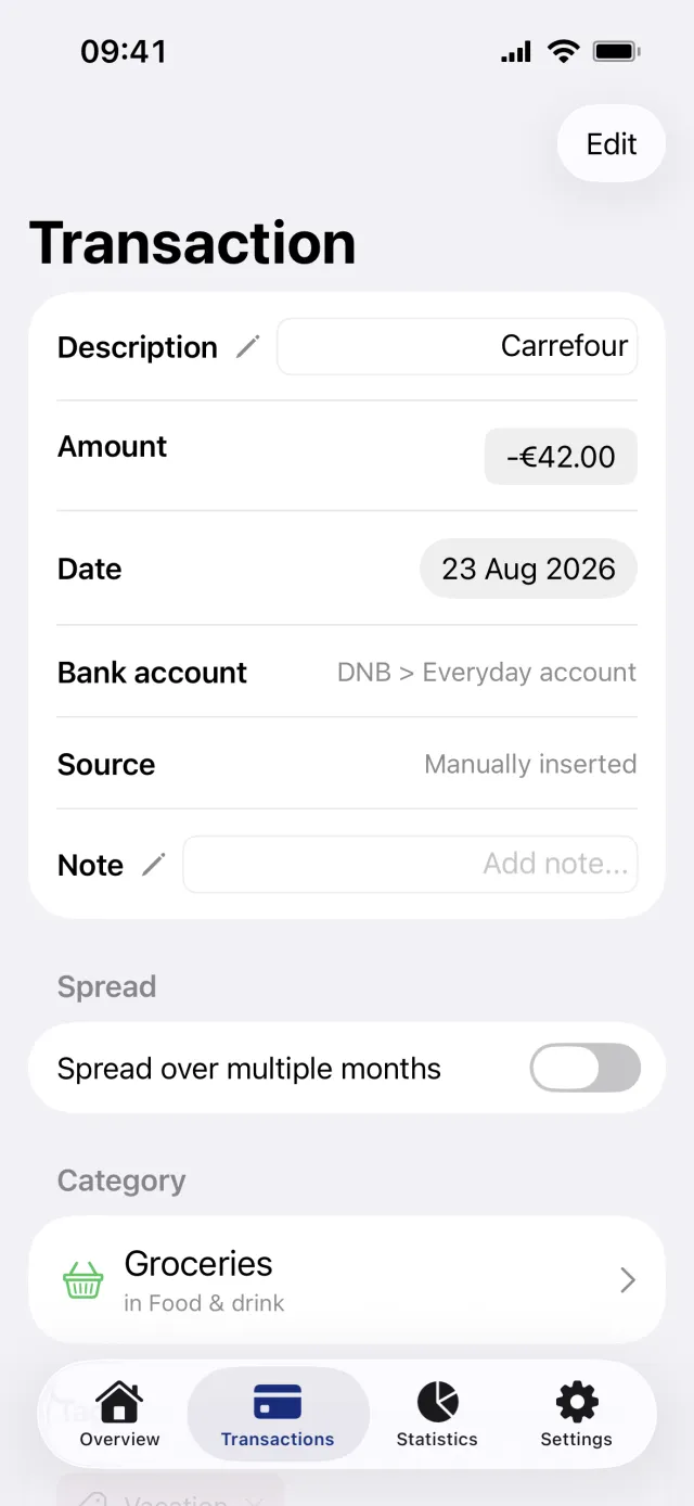 The Transaction screen for a Carrefour purchase, with the editable Description, Amount and Date fields, the spread toggle switched off and Groceries as the category